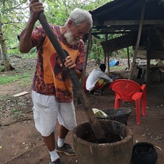 Charl pounding bark for dye