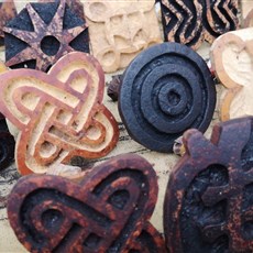 Adinkra symbols carved into calabash