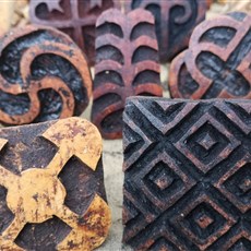 Adinkra symbols carved into calabash