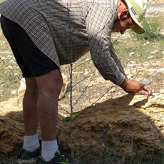 Lighting a cigarette with a magnifying glass